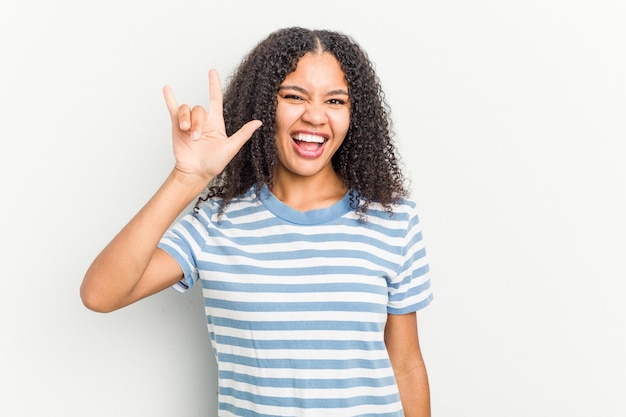 Showing a horns gesture as a revolution concept