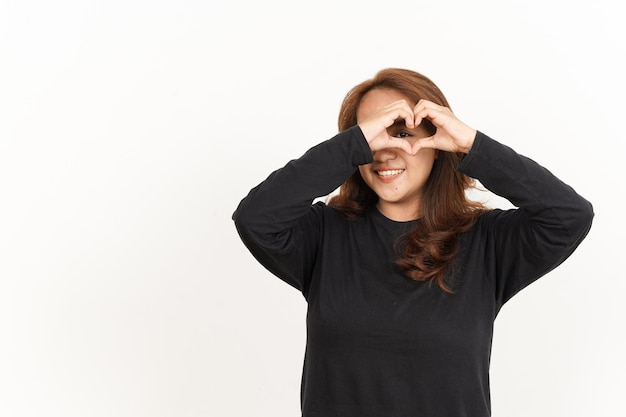 Showing Love or Heart Sign Of Beautiful Asian Woman Wearing Black Shirt Isolated On White Background