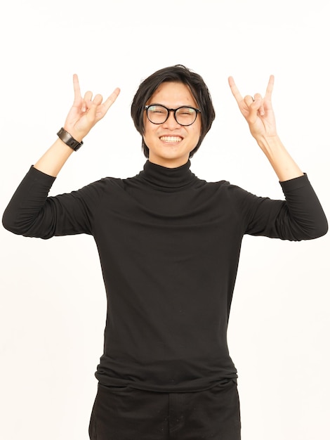 Showing Metal Hand Sign Of Handsome Asian Man Isolated On White Background