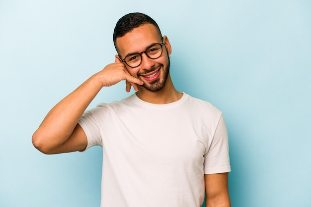 Showing a mobile phone call gesture with fingers