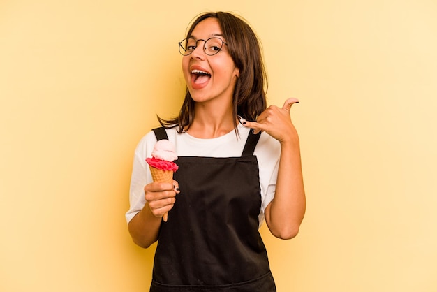 Showing a mobile phone call gesture with fingers