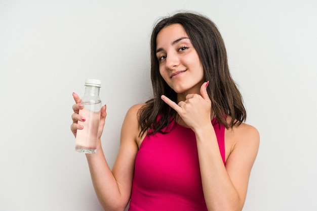 Showing a mobile phone call gesture with fingers