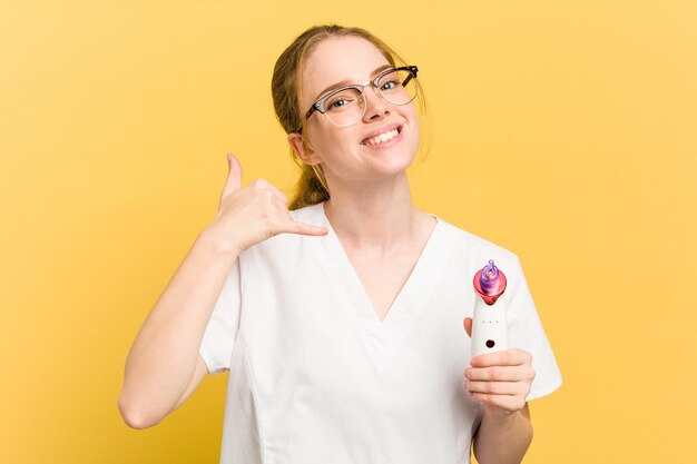 Showing a mobile phone call gesture with fingers