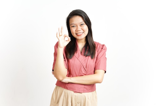 Showing OK Approved sign Of Beautiful Asian Woman Isolated On White Background