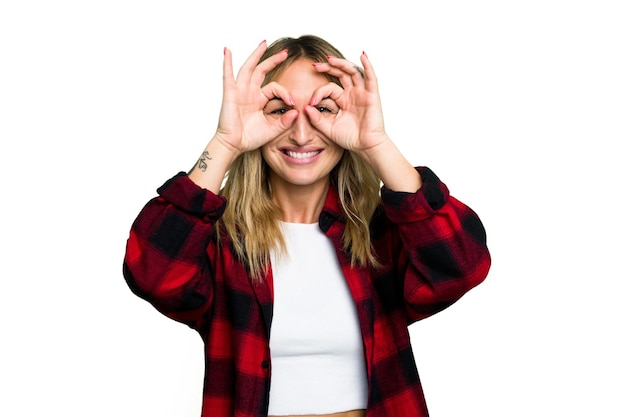 Photo showing okay sign over eyes