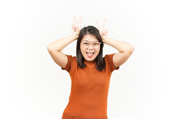 Showing Peace Sign Of Beautiful Asian Woman Isolated On White Background