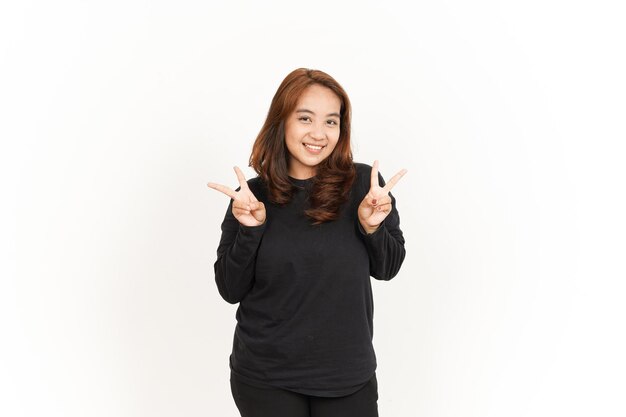 Showing Peace Sign Of Beautiful Asian Woman Wearing Black Shirt Isolated On White Background