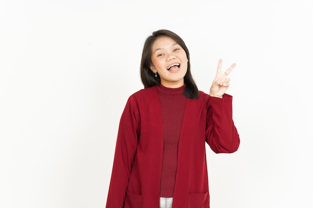 Showing Peace Sign Of Beautiful Asian Woman Wearing Red Shirt Isolated On White Background