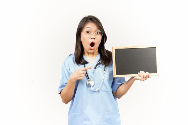 Showing Presenting and holding Blank Blackboard Of Asian Young Doctor Isolated On White Background