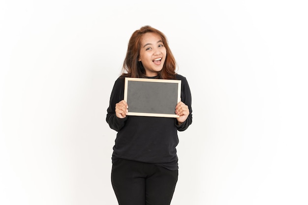 Showing, Presenting and holding Blank Blackboard Of Beautiful Asian Woman Wearing Black Shirt