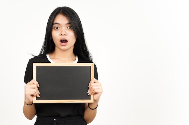 Showing Presenting and holding Blank Blackboard with Shocked Face Of Beautiful Asian Woman