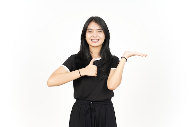 Showing and Presenting Product on Open Palm with Thumbs up Of Beautiful Asian Woman Isolated