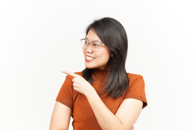 Showing Product and Pointing Side Of Beautiful Asian Woman Isolated On White Background