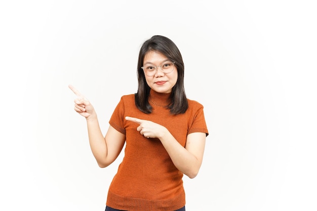 Showing Product and Pointing Side Of Beautiful Asian Woman Isolated On White Background