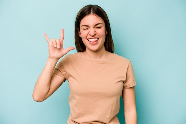 Showing rock gesture with fingers