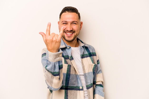 Showing rock gesture with fingers