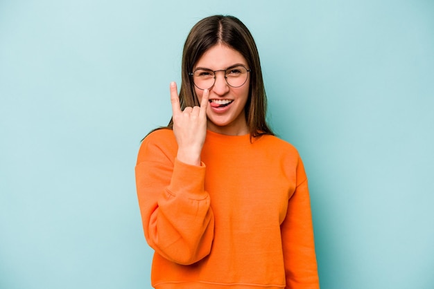 Showing rock gesture with fingers