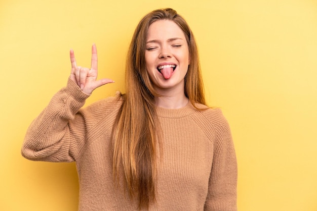 Showing rock gesture with fingers