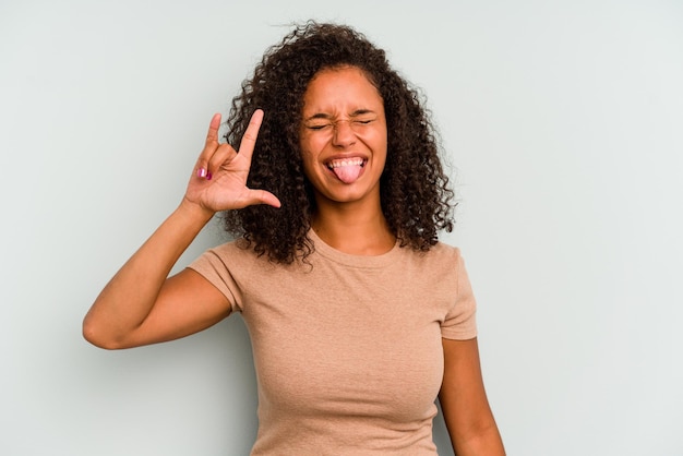 Showing rock gesture with fingers