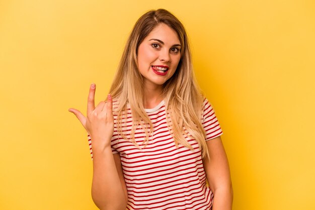 Showing rock gesture with fingers