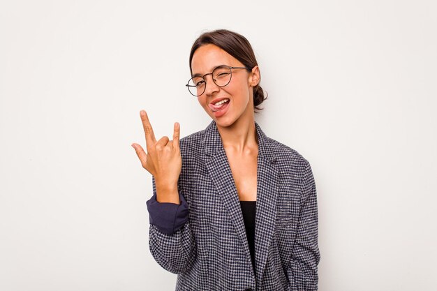 Showing rock gesture with fingers