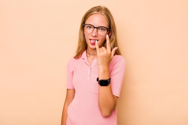 Showing rock gesture with fingers