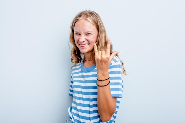 Showing rock gesture with fingers