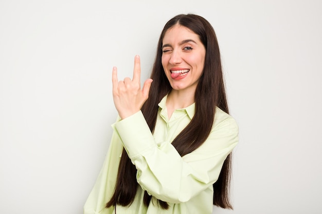 Showing rock gesture with fingers