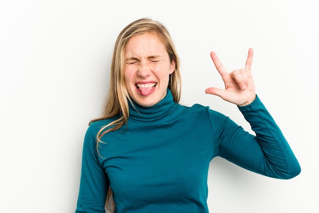 Showing rock gesture with fingers