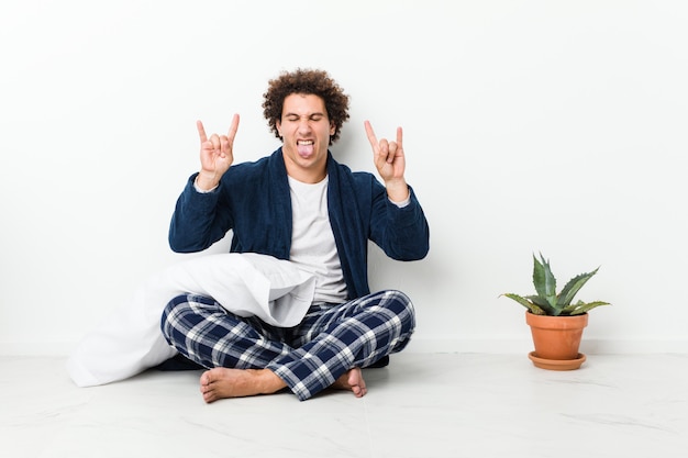 Photo showing rock gesture with fingers