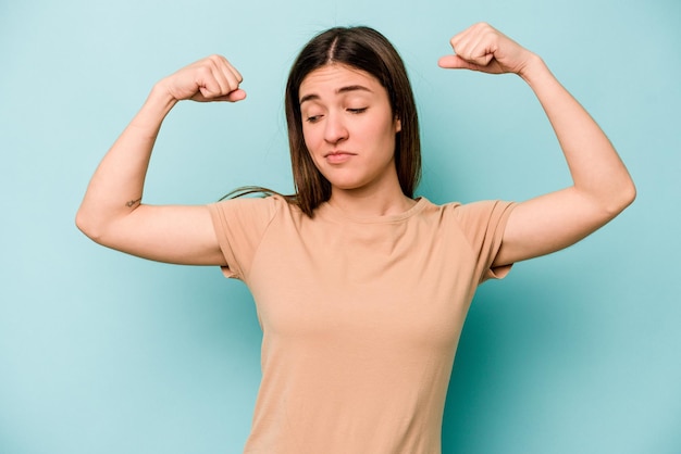 Showing strength gesture with arms symbol of feminine power