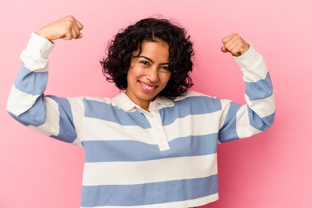 Showing strength gesture with arms symbol of feminine power