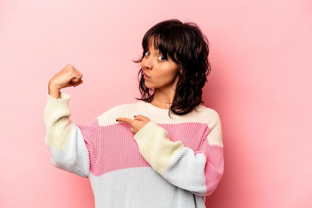 Showing strength gesture with arms symbol of feminine power