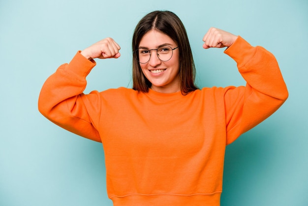 Showing strength gesture with arms symbol of feminine power