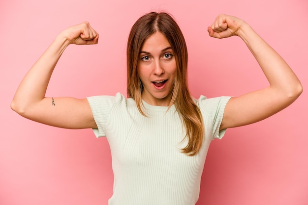 Showing strength gesture with arms symbol of feminine power