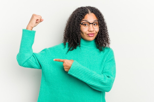 Showing strength gesture with arms symbol of feminine power