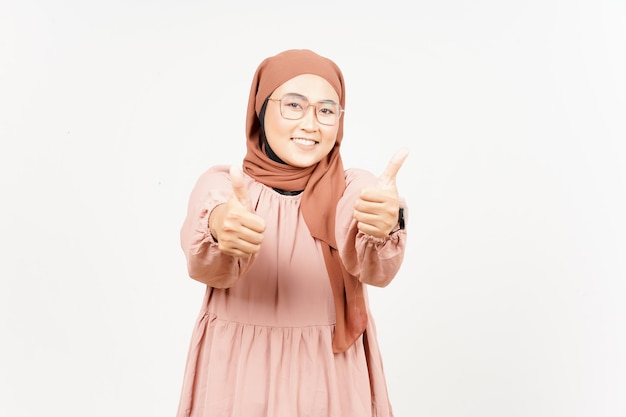 Showing thumbs up of Beautiful Asian Woman Wearing Hijab Isolated On White Background