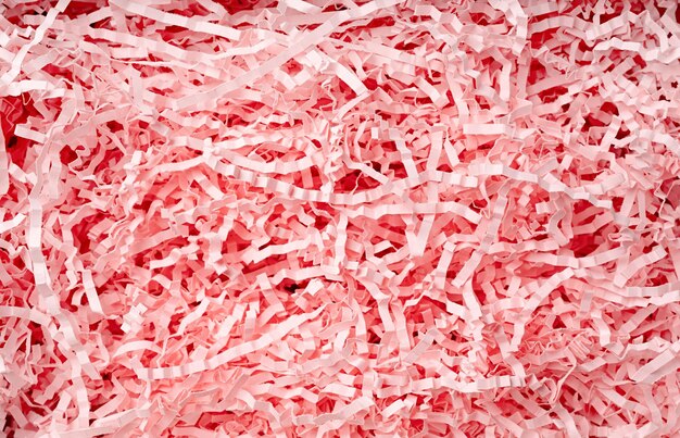 Struttura del materiale di imballaggio di carta rosa tagliuzzata