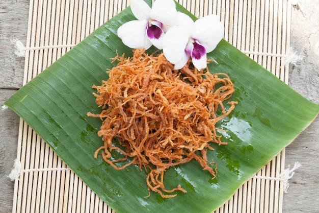 Shredded pork  on banana leaf 