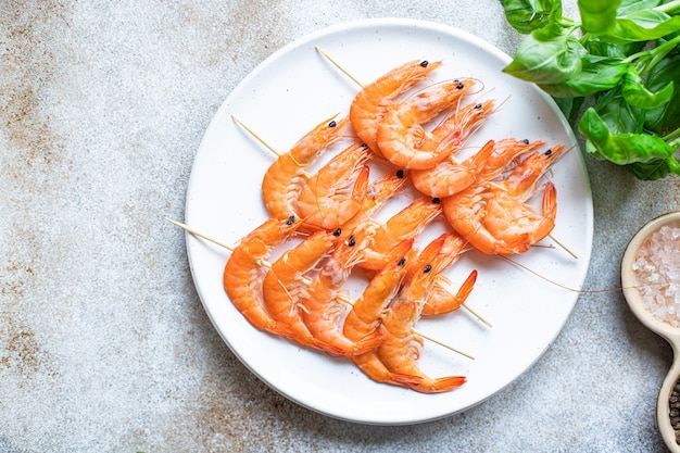 Photo shrimp kebab seafood skewer prawns spices marinade snack