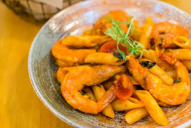 Shrimp pasta on the dish in restaurant