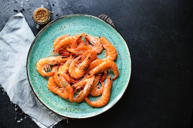 Shrimp prawn seafood ready to eat cooked serving on a plate snack