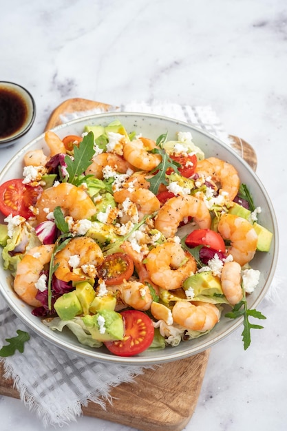 Shrimp salad with cherry tomatoes and avocado