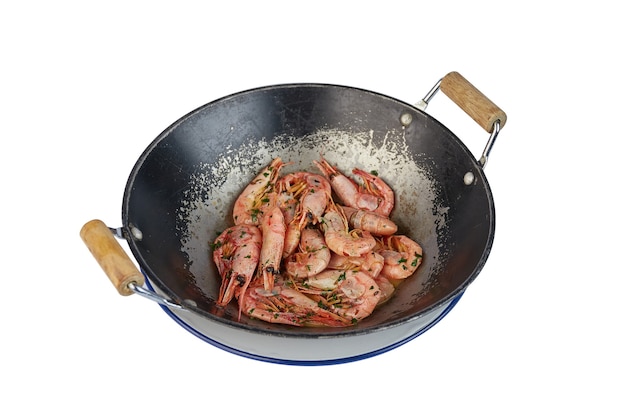 Shrimp in a wooden plate on white.