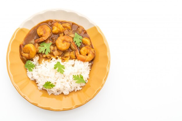 Shrimps in curry sauce on topped rice