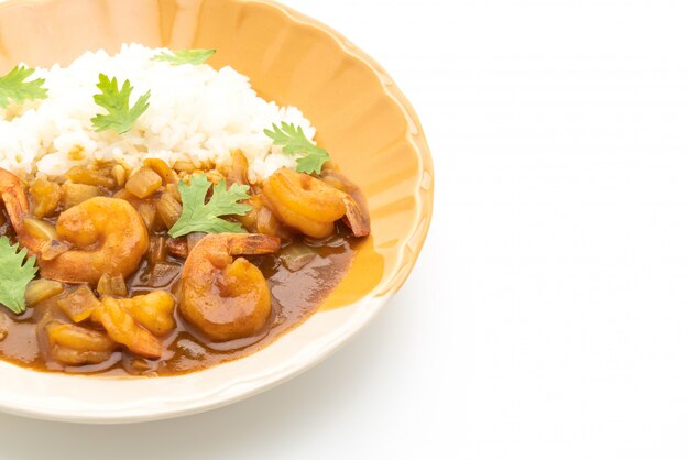 Shrimps in curry sauce on topped rice