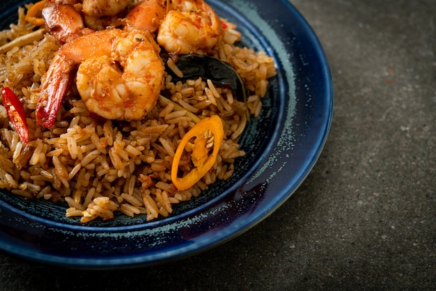 Shrimps fried rice with herbs and spices - asian food style