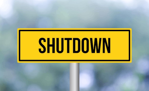 Shutdown road sign on blur background