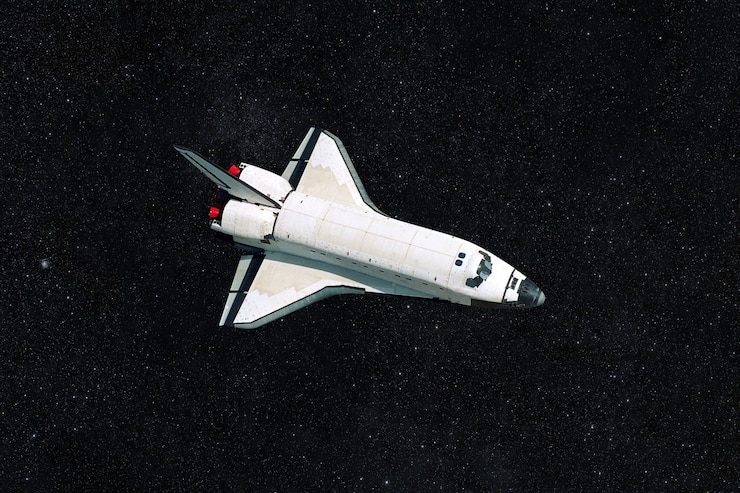 Photo shuttle in outer space on a dark starry background. spaceship flies and explores the universe