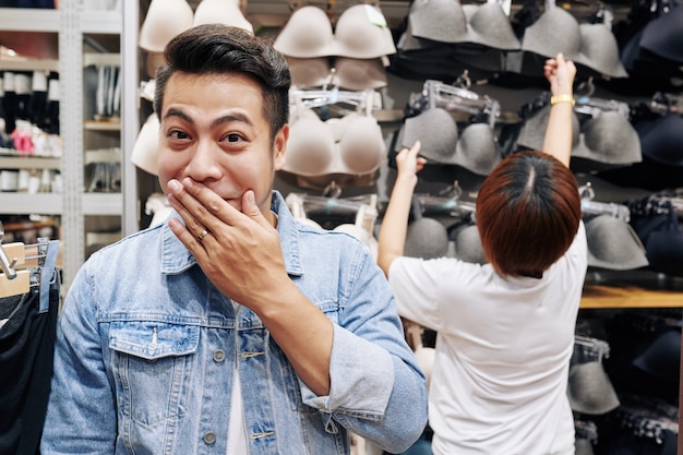 Shy Man In Lingerie Store